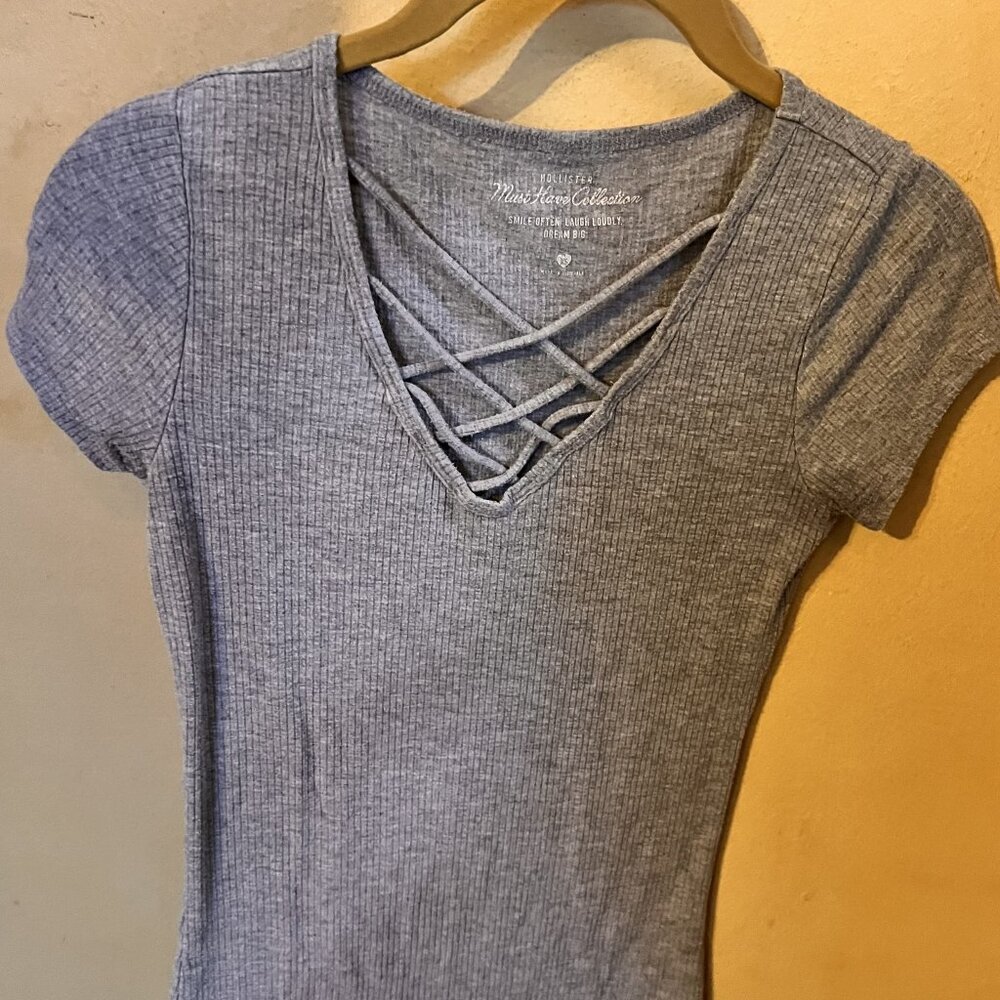 Grey Hollister Shirt with Twisted Embellishments in center of V-neckline, Small
